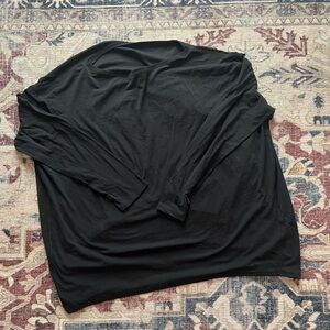 Lululemon back in action long sleeve nulu in black